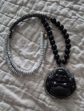 Black Buddha Pendant Necklace with Silver Accents